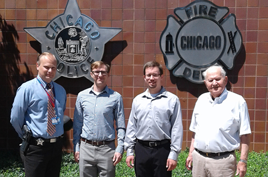 (Left to Right): officer Kevin Hacker, Haris Latic (CE ‘17) and Nicholas Wozniak (CE, PhD Student) and Dr. Anatol Longinow