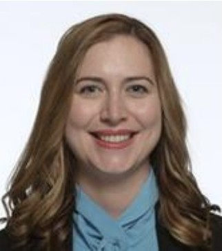 A woman smiling in a headshot.